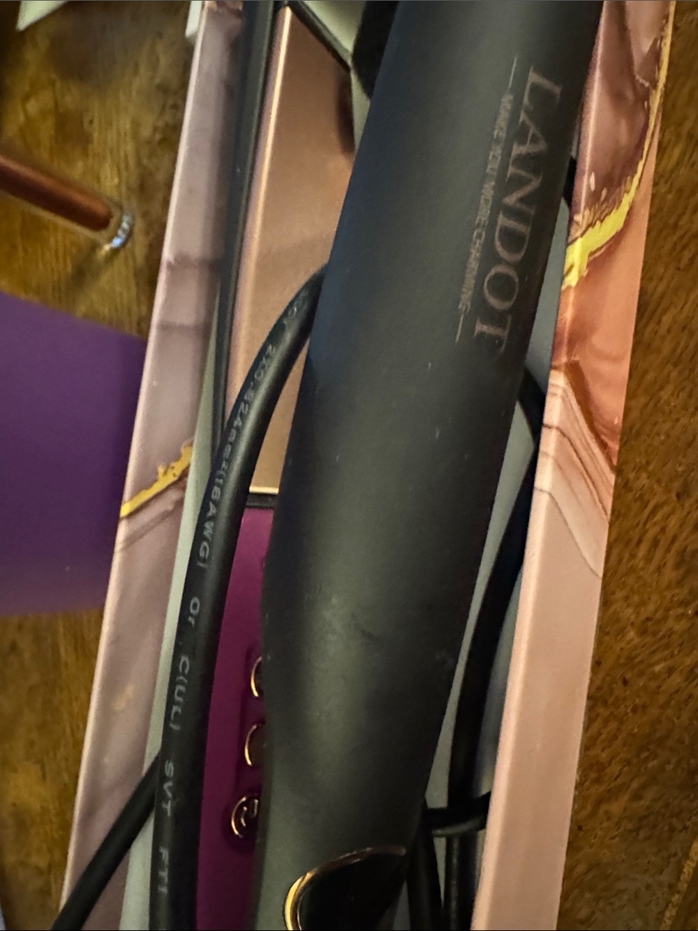 Black Hair Straightener — Sleek Styling Tool in Black